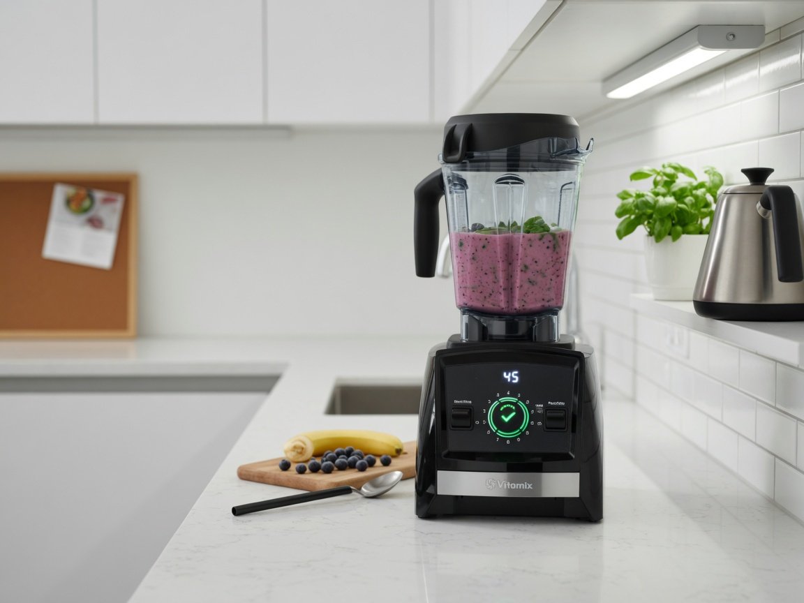 Vitamix Propel 510 in gloss black on a compact kitchen counter, a smoothie program indicator lit on the control panel